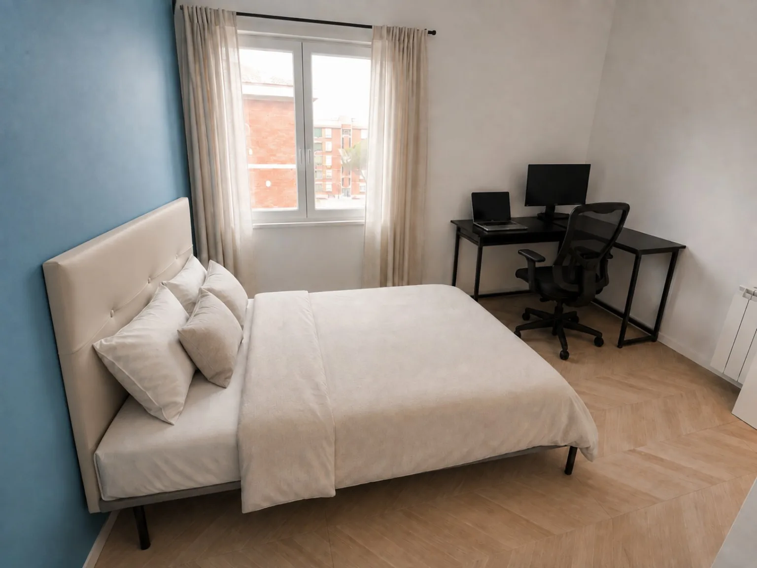 Camera Blu con letto e postazione lavoro